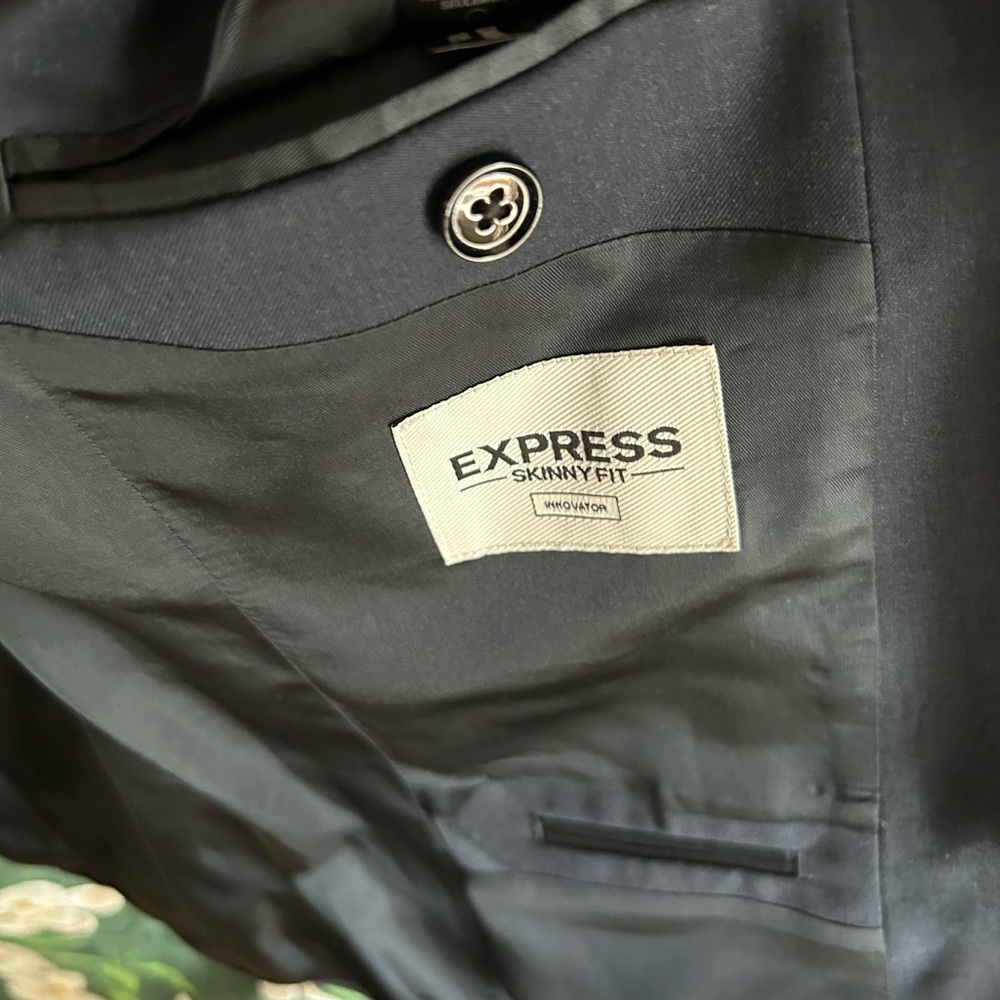 Express blazer men navy blue wool skinny fit was worn few times for a short time
